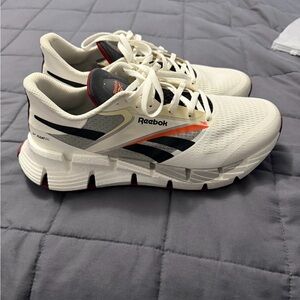 Reebok White and Black Running Shoes with Red Accents